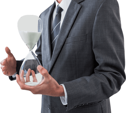 Transparent hourglass held by businessman in suit