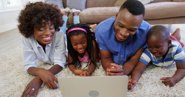 Happy Family Watching Video on Laptop at Home - Download Free Stock Images Pikwizard.com