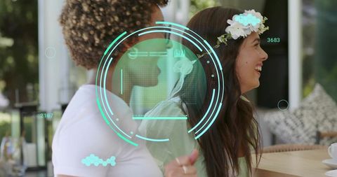 Friends Laughing on Patio Wearing Floral Headband with Futuristic HUD Overlay