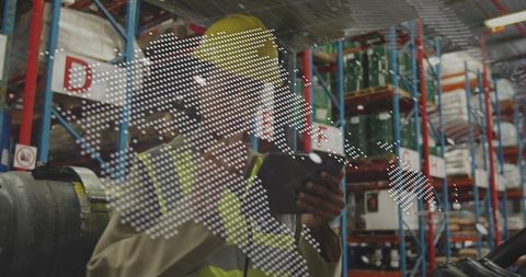 Warehouse inspector holding tablet with world map overlay for global logistics tracking