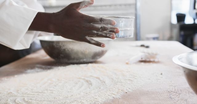 Hands Sifting Flour in Kitchen for Baking Preparation - Download Free Stock Images Pikwizard.com