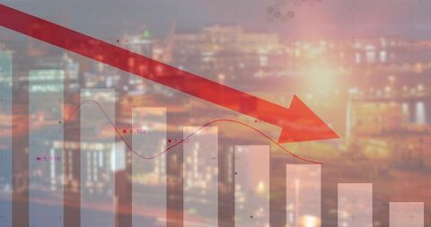 Falling market trend over urban skyline at sunset with red downward arrow and bar chart
