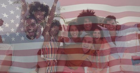 Diverse friends celebrating on beach with semitransparent american flag