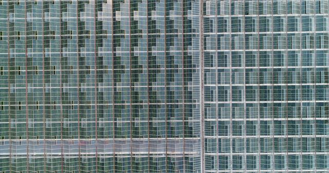 Aerial View of Modern Glass Skyscraper with Grid Pattern - Download Free Stock Images Pikwizard.com