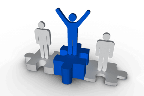 three figures standing on puzzle podium with symbol of success - Download Free Stock Videos Pikwizard.com