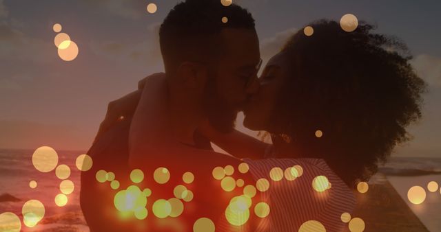 Couple Embracing and Kissing on Beach with Bokeh Lights Effect - Download Free Stock Images Pikwizard.com