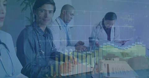 Clinical team analyzing patient data and financial charts during medical strategy meeting