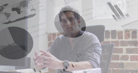 Businessman Analyzing Data in Modern Office Setting