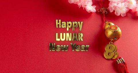 Lunar New Year Gold Décor on Red Background Festive Celebration