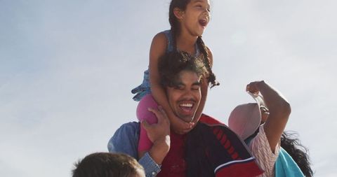 Joyful Family Enjoying Time Together Outdoors