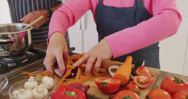 Senior Woman Preparing Vegetables for Cooking at Home Kitchen - Download Free Stock Images Pikwizard.com