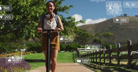 Woman Enjoying Electric Scooter Ride with Social Media Engagement Icons