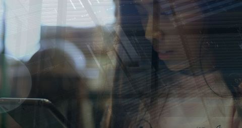 Asian Teen Engaging with Technology Through Digital Tablet and Data