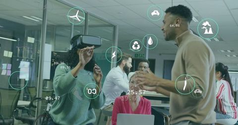 Team Collaborating Using VR and Data Overlays in Modern Office Workshop for Innovation