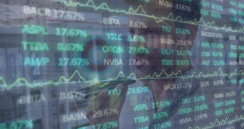 Investor Analyzing Financial Data with Mobile Technology