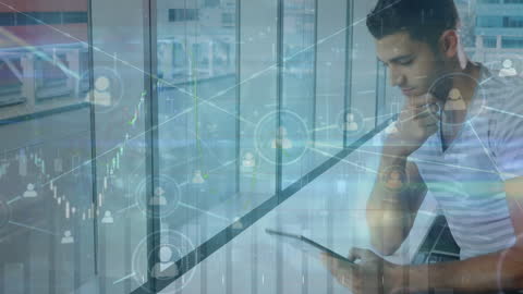 Businessman Analyzing Digital Financial Data with Network Overlay in Office