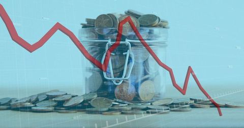 Concept of economic decline with coin jar and downward graph