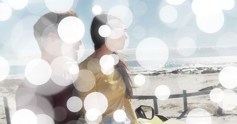 Couple Enjoying Coastal Drive in Yellow Convertible