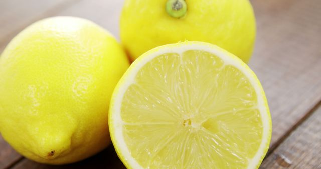 Fresh Lemons on Wooden Surface Highlighting Vibrant Yellow Color - Download Free Stock Images Pikwizard.com