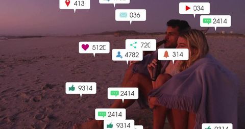 Couple on Beach with Social Media Overlay Reflecting Online Engagement