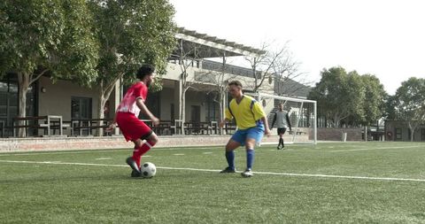 Intense Soccer Match Action Demonstrating Strategical Play