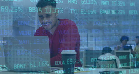 Financial Data Overlays on Businessman Using Laptop in Office