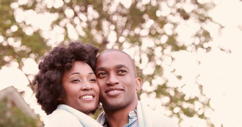 Happy Couple Embracing Outdoors in Warm Light - Download Free Stock Images Pikwizard.com