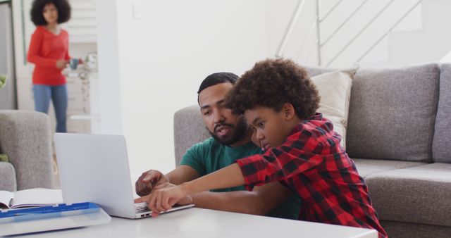 Father and Son Using Laptop for Learning at Home - Download Free Stock Images Pikwizard.com