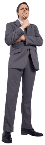 Professional or business context illustration possible with this image of a businessman thoughtfully holding a pen while wearing a formal suit. Ideal for consulting, strategy, decision-making, corporate analysis, entrepreneurial storytelling visual requirements. Stylish promotional use appeals better showing reflective and senior business maturity expressed by subjects dressed enviably.