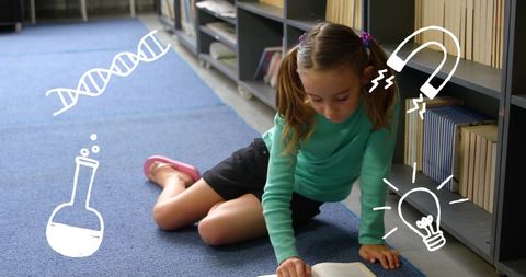 Curious schoolgirl engaged in science in library