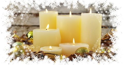 Festive candles with snowflake frame for cozy holiday decor