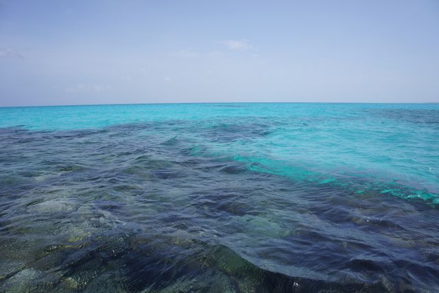 Clear Turquoise Ocean Water Meeting Deep Blue Horizon - Download Free Stock Photos Pikwizard.com