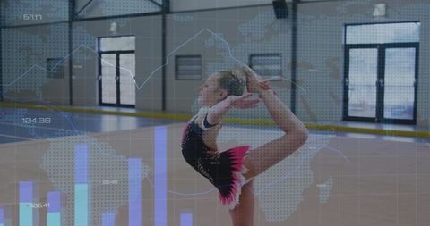 Young gymnast performing needle scale in pink and black leotard in gym with data overlay
