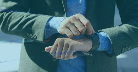 Businessman Engaging with Smartwatch Technology Interface - Download Free Stock Images Pikwizard.com