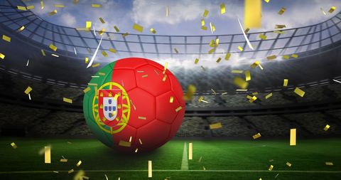Portugal Flag Wrapped Soccer Ball on Stadium Field