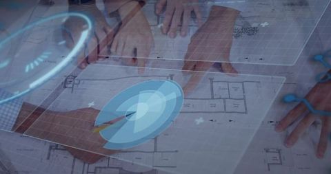 Architects collaborating around digital blueprint using holographic overlay and stylus