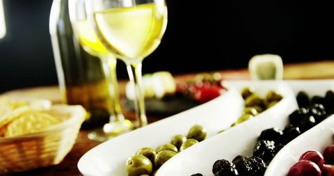 Elegant Wine and Olive Pairing for Gourmet Gathering - Download Free Stock Images Pikwizard.com