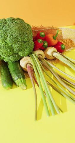 Fresh Organic Vegetables on Vibrant Yellow Background - Download Free Stock Images Pikwizard.com