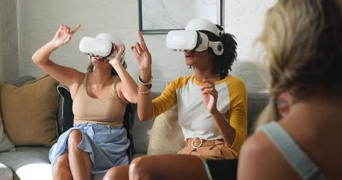 Diverse Women Exploring Virtual Reality at Home in Casual Wear