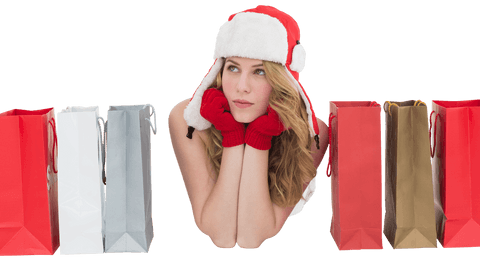Thoughtful Woman in Santa Hat Amongst Transparent Shopping Bags