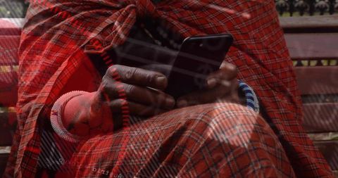 Man in red plaid preparing scrolls ending licensing adhesions all myth