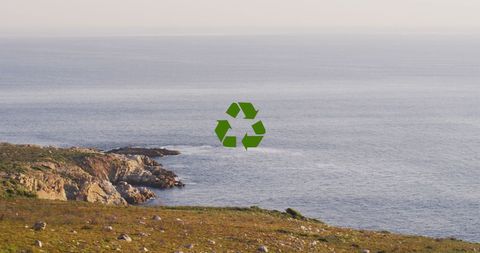 Recycling Symbol Over Coastal Landscape Represents Eco-Friendly Symbolism