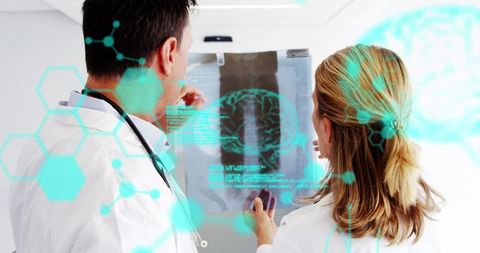 Doctors Analyzing Brain Scan in High-Tech Medical Environment - Download Free Stock Images Pikwizard.com