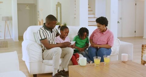 African american family celebrating pregnancy at home