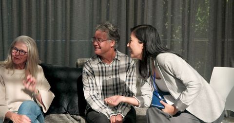 Supportive group therapy session with warm interaction