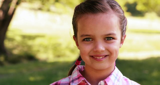 Smiling Young Girl Outdoors in Park - Download Free Stock Images Pikwizard.com