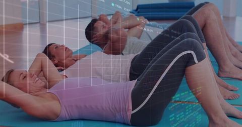 Group Core Workout with Data Overlay Showing Performance Metrics for Fitness Tech