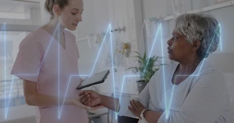 Medical Professional Monitoring Elderly Patient with Heart Rate Overlay