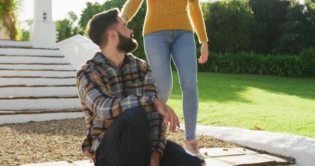 Young Couple in Relaxed Outdoor Setting Enjoying Time Together - Download Free Stock Images Pikwizard.com