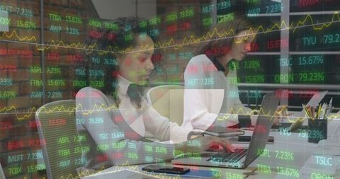 Diverse Colleagues Analyzing Stock Market Trends on Laptops - Download Free Stock Images Pikwizard.com